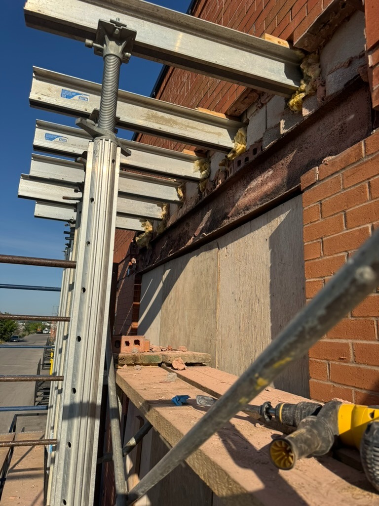 Scaffolding and shoring system during commercial brick restoration
